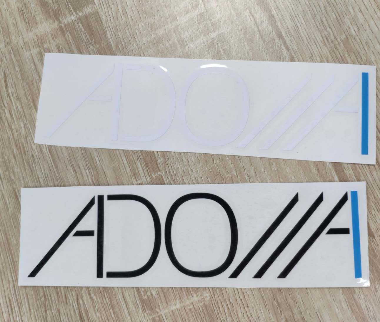 A vinyl sticker featuring the word "Adonai," a Hebrew name for God, is displayed. The sticker is from Now Found.