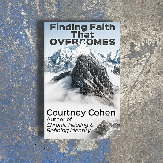 Book cover of 'Finding Faith That Overcomes' by Courtney Cohen with a mountainous landscape on a textured background