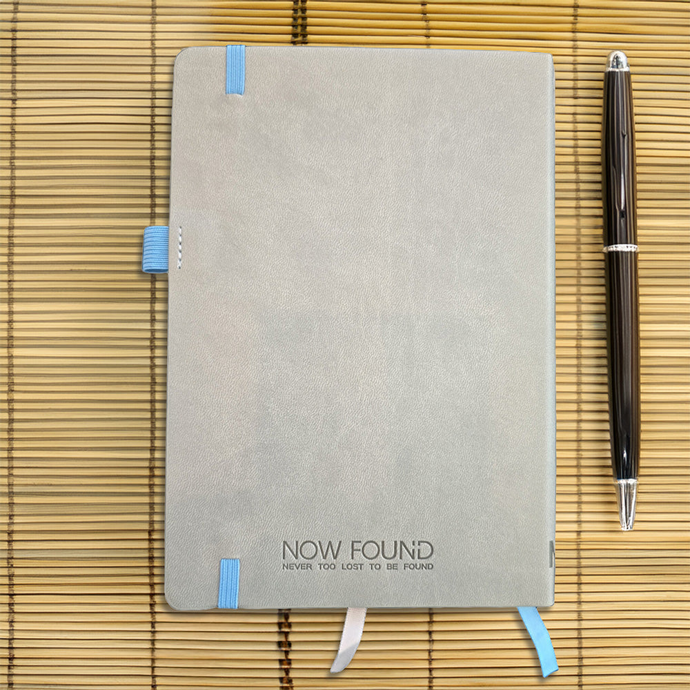 Back of 
Never Too Lost To Be Found Dot Grid Christian Journal on Bamboo with wooden pen