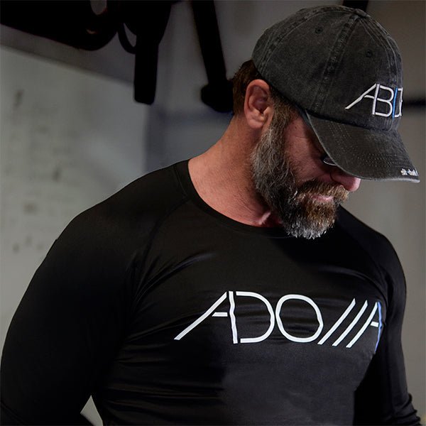 A dry-fit long sleeve shirt with the word "Adonai," a Hebrew name for God displayed. This is Christian apparel.