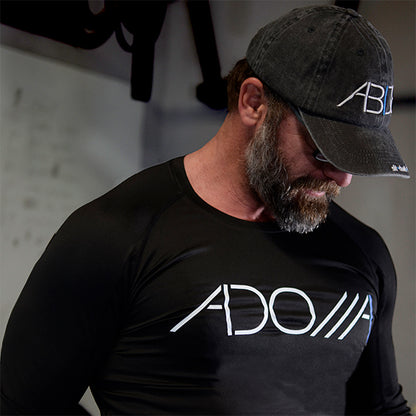 A dry-fit long sleeve shirt with the word "Adonai," a Hebrew name for God displayed. This is Christian apparel.